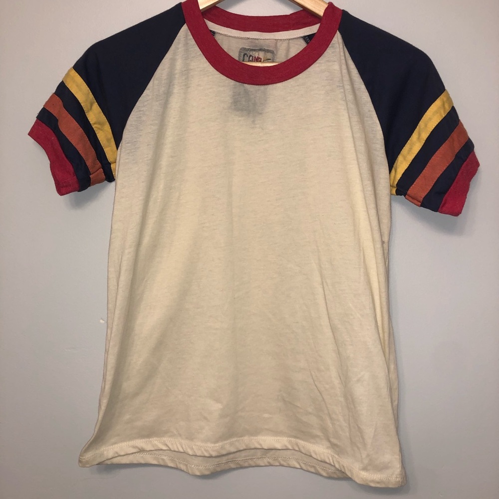 Light yellow t-shirt with colorful sleeves